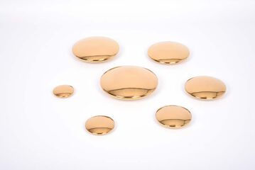 Piedras sensoriales reflectantes TickiT Oro 7 unidades